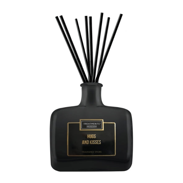 TFQ07 Hugs and Kisses fragrance sticks in an elegant black vase, featuring natural sticks and a luxurious scent blend.