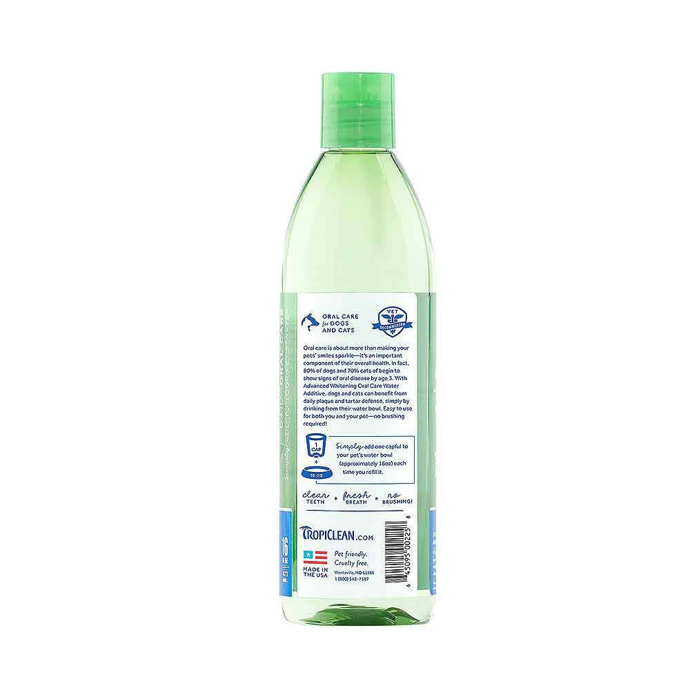 Tropiclean Advanced Whitening Oral Care Water Additive in a 16 oz bottle, designed for pet dental health with a clear liquid formula.