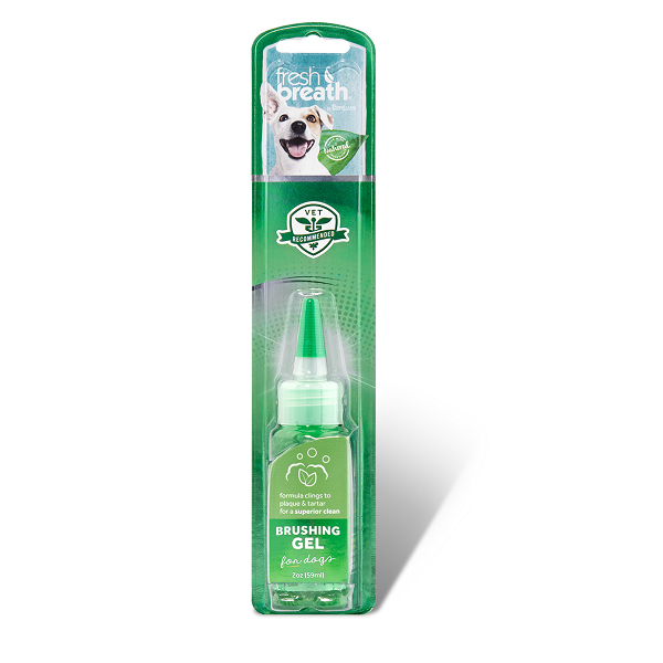 Tropiclean Fresh Breath Brushing Gel for Dogs in a bottle with a brush, promoting dental health.