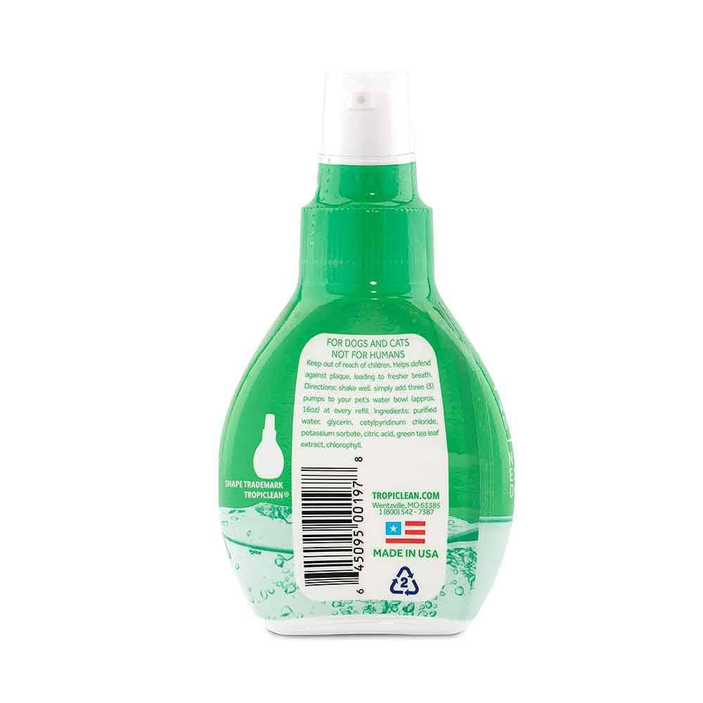 Tropiclean Fresh Breath Drops for Pets in a bottle with a label showcasing natural ingredients for oral care.