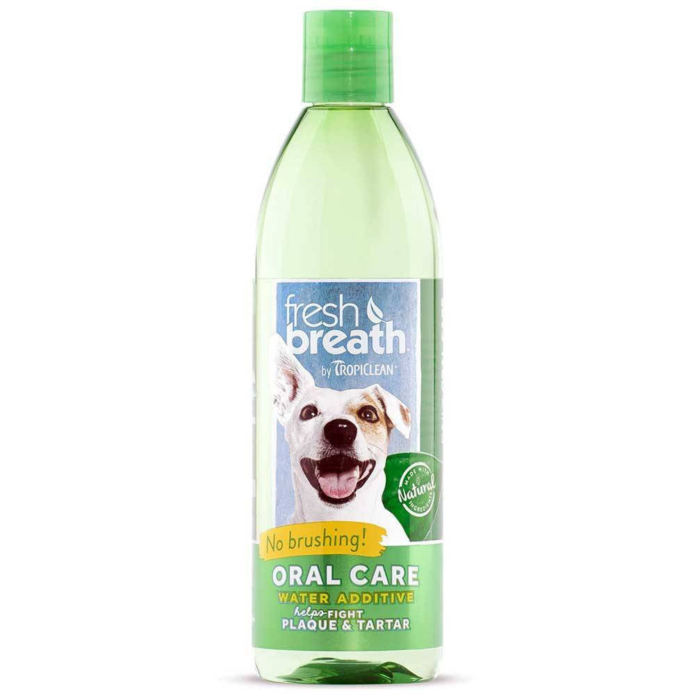 Tropiclean Fresh Breath Oral Care Water Additive for dogs in a bottle, promoting dental health and fresh breath.