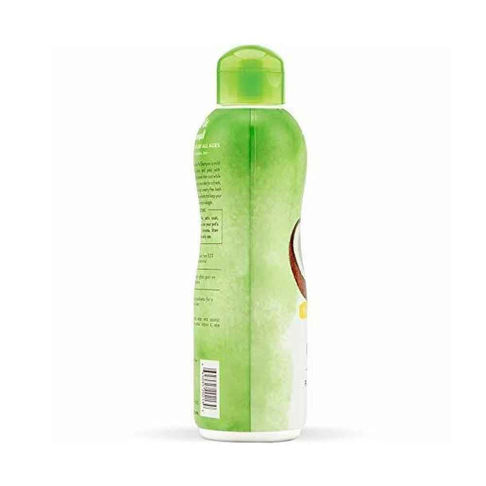 A bottle of Tropiclean Gentle Coconut Pet Shampoo for puppies and kittens, featuring a coconut design and a 12 oz size.