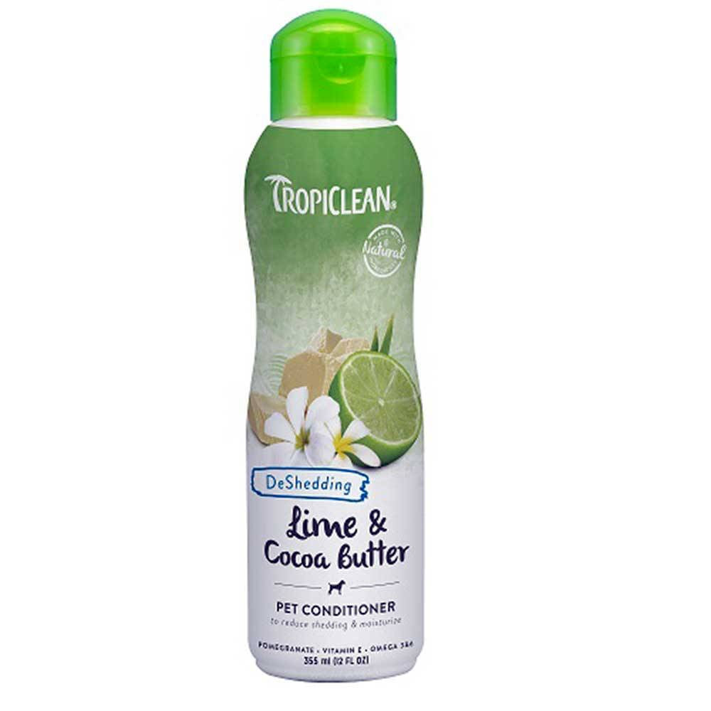 Tropiclean Lime & Cocoa Butter Pet Conditioner bottle with a tropical design, showcasing its natural ingredients and moisturizing properties.