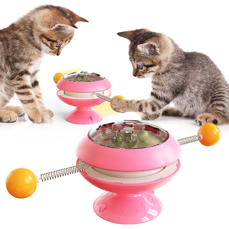 Turntable Cat Toy featuring a teasing stick and catnip ball, designed for interactive play and engagement for cats.