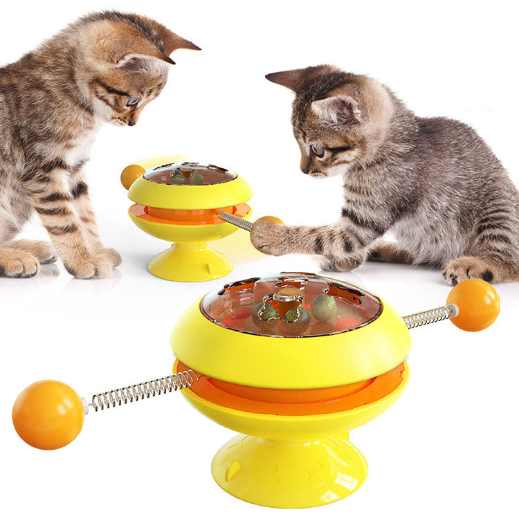 Turntable Cat Toy featuring a teasing stick and catnip ball, designed for interactive play and engagement for cats.
