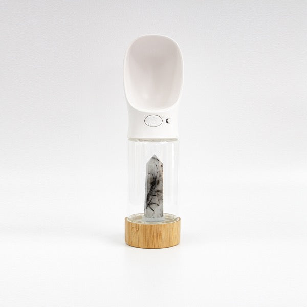 Urban Oasis crystal-infused water bottle with natural crystals, eco-friendly design, perfect for hydration on-the-go.