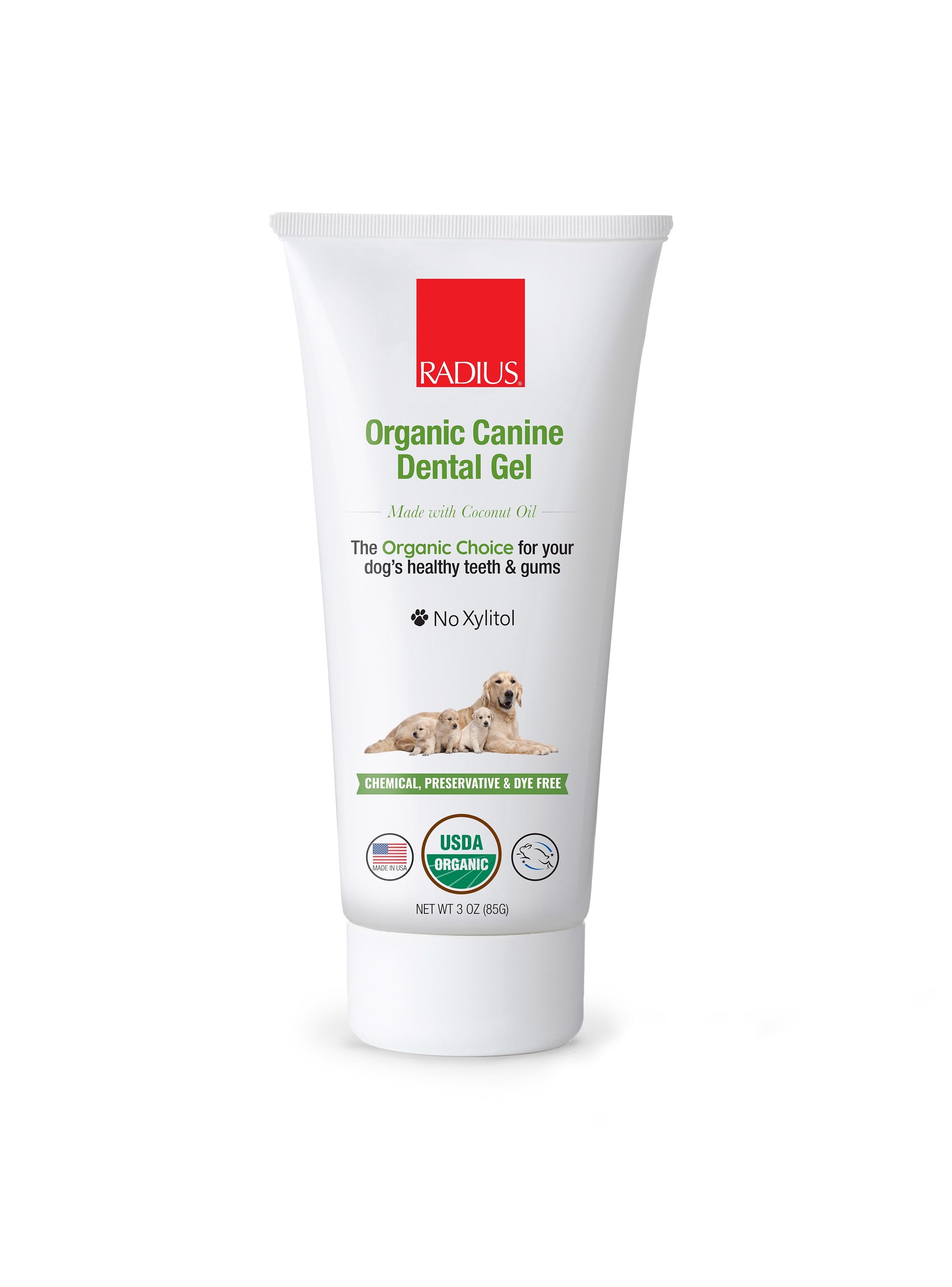 USDA Organic Canine Toothpaste in a tube with sweet potato and mint ingredients displayed around it.