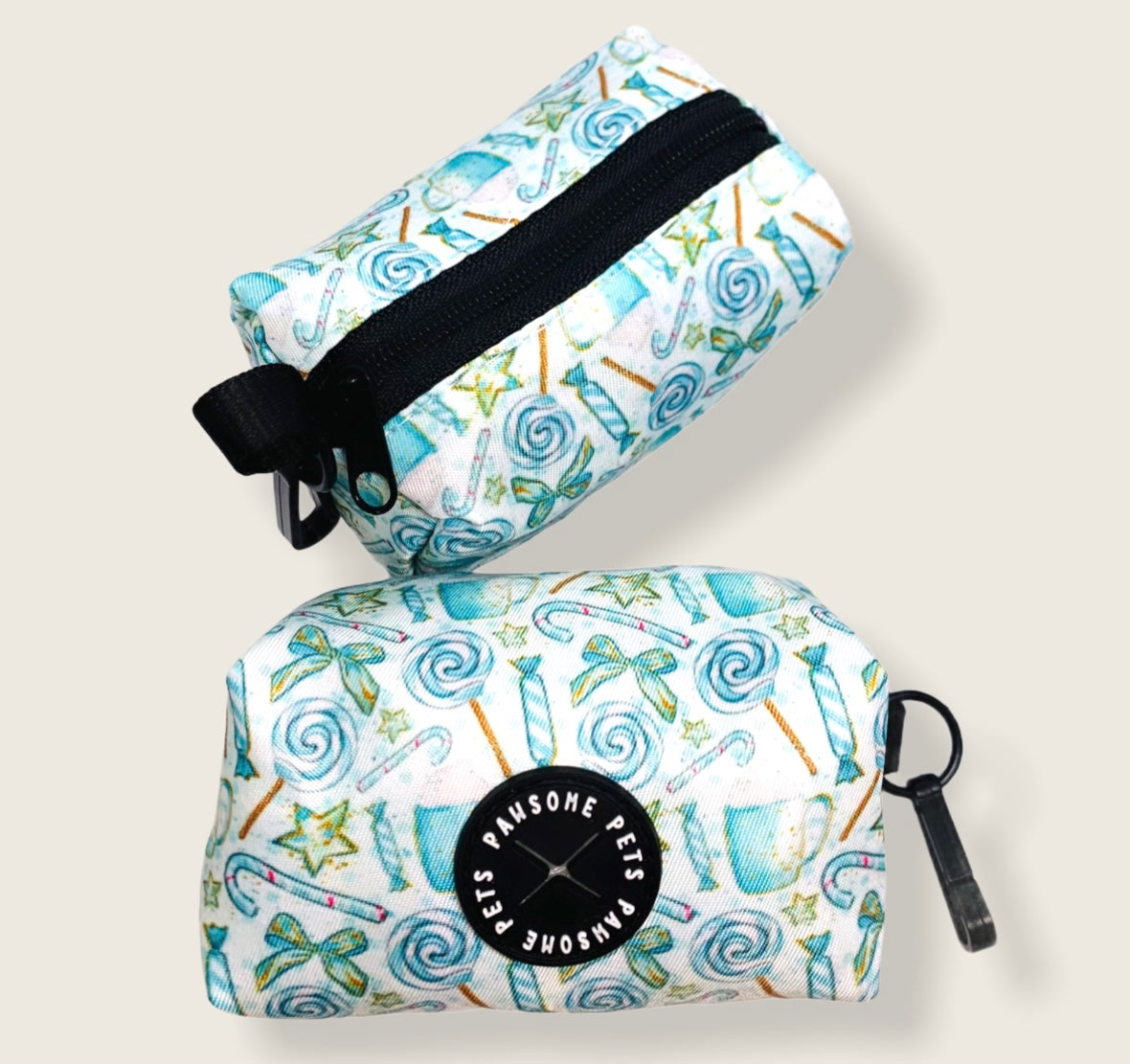 WASTE BAG HOLDER-Lollipop made of heavyweight neoprene, featuring a black clasp and a small zipper pull, designed for easy waste management.