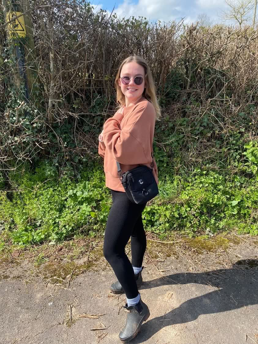 A stylish waterproof dog walking bag with multiple compartments, designed for pet owners to keep essentials organized during walks.