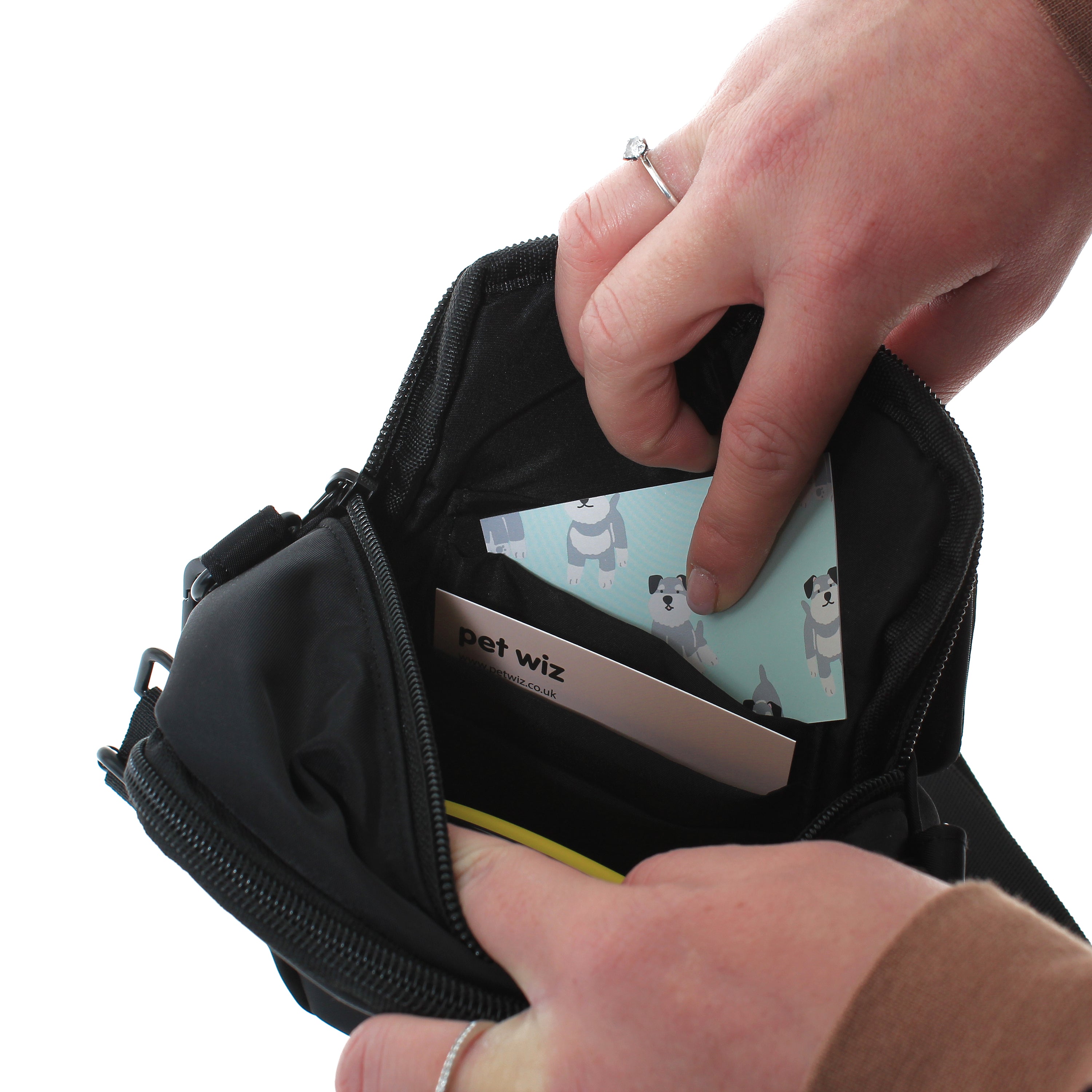 A stylish waterproof dog walking bag with multiple compartments, designed for pet owners to keep essentials organized during walks.