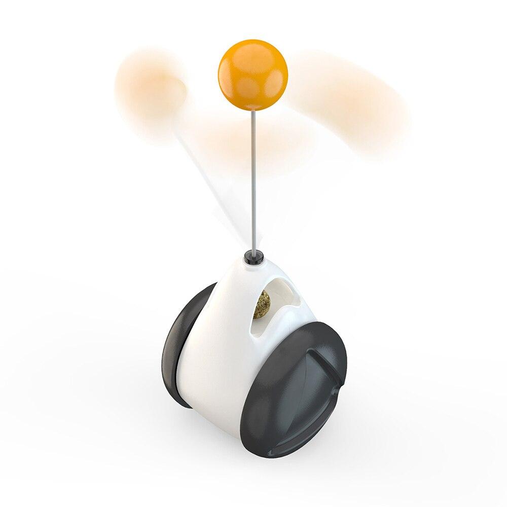 A cute black and white wheel self-balance pet toy designed for interactive play with cats, featuring a mint ball for attraction.