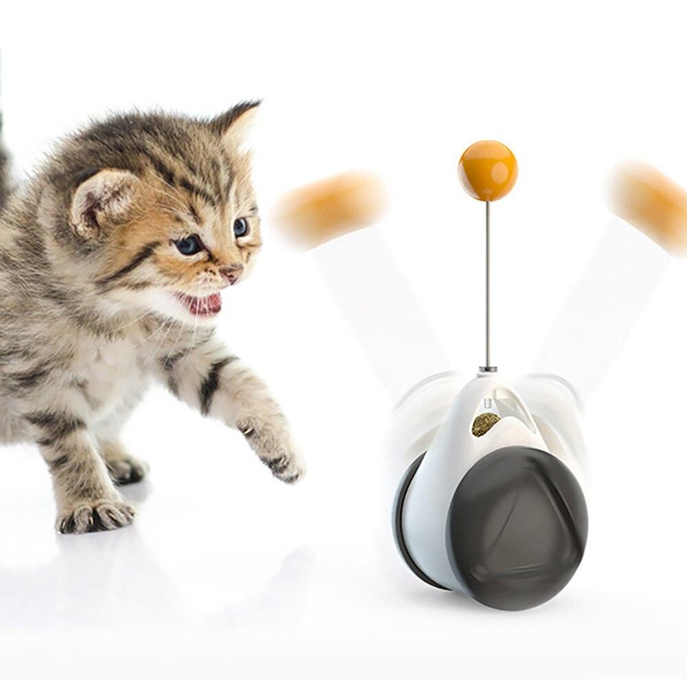 A cute black and white wheel self-balance pet toy designed for interactive play with cats, featuring a mint ball for attraction.