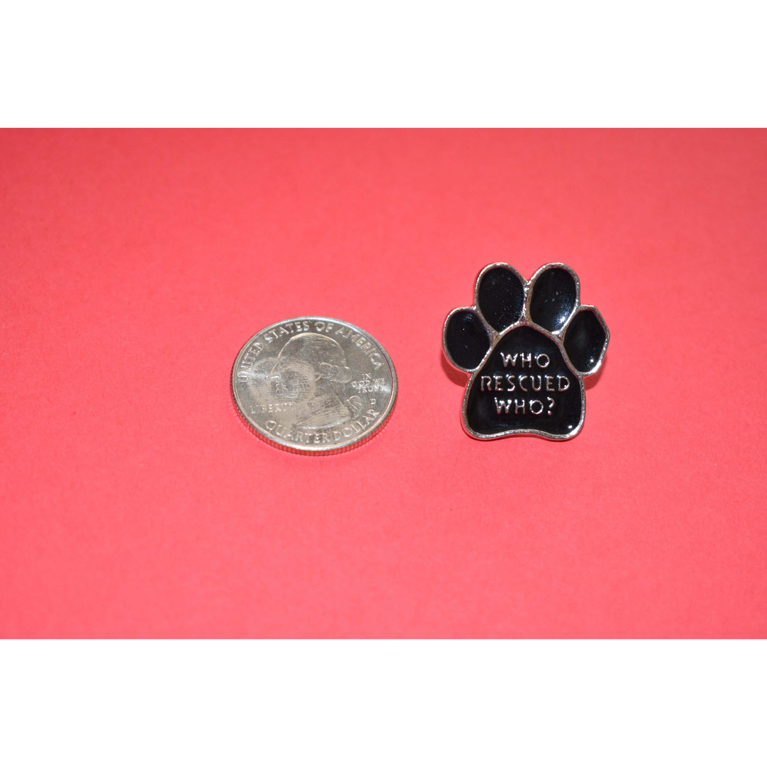 Who Rescued Who Enamel Pin featuring a cute design, perfect for dog lovers and rescue advocates.