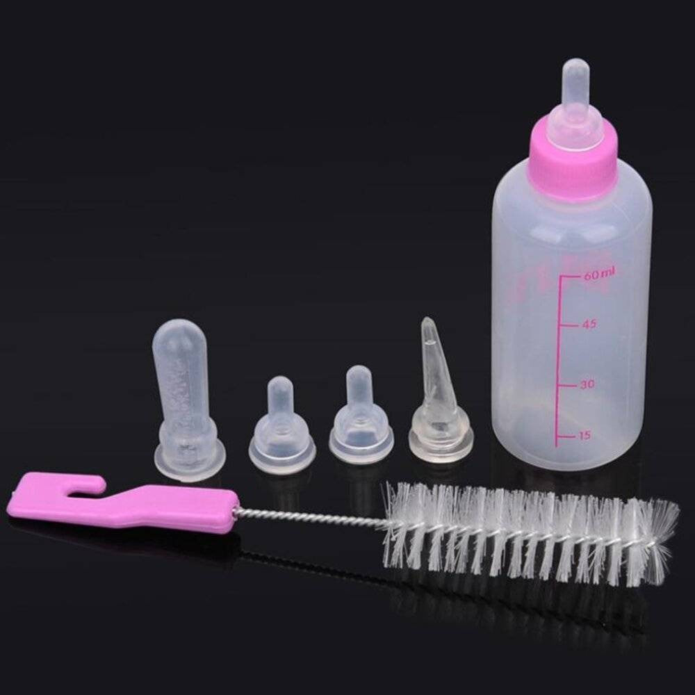 Wiggles Pet Dog Nursing Feeding Bottle with a soft pacifier and cleaning brush, designed for safe and comfortable feeding.