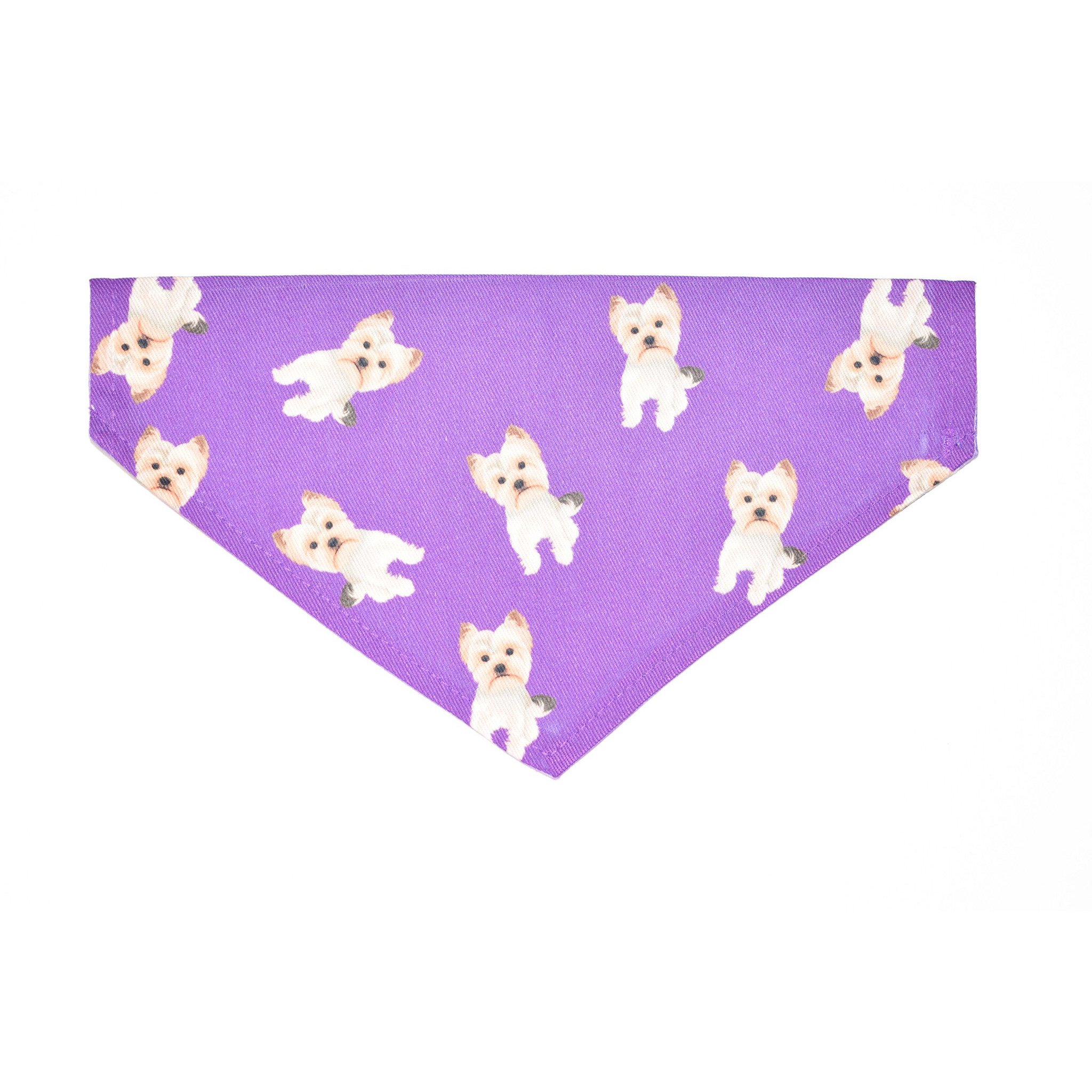 A stylish slip-on bandana for Yorkies, made from durable canvas fabric, featuring a unique design and handmade quality.