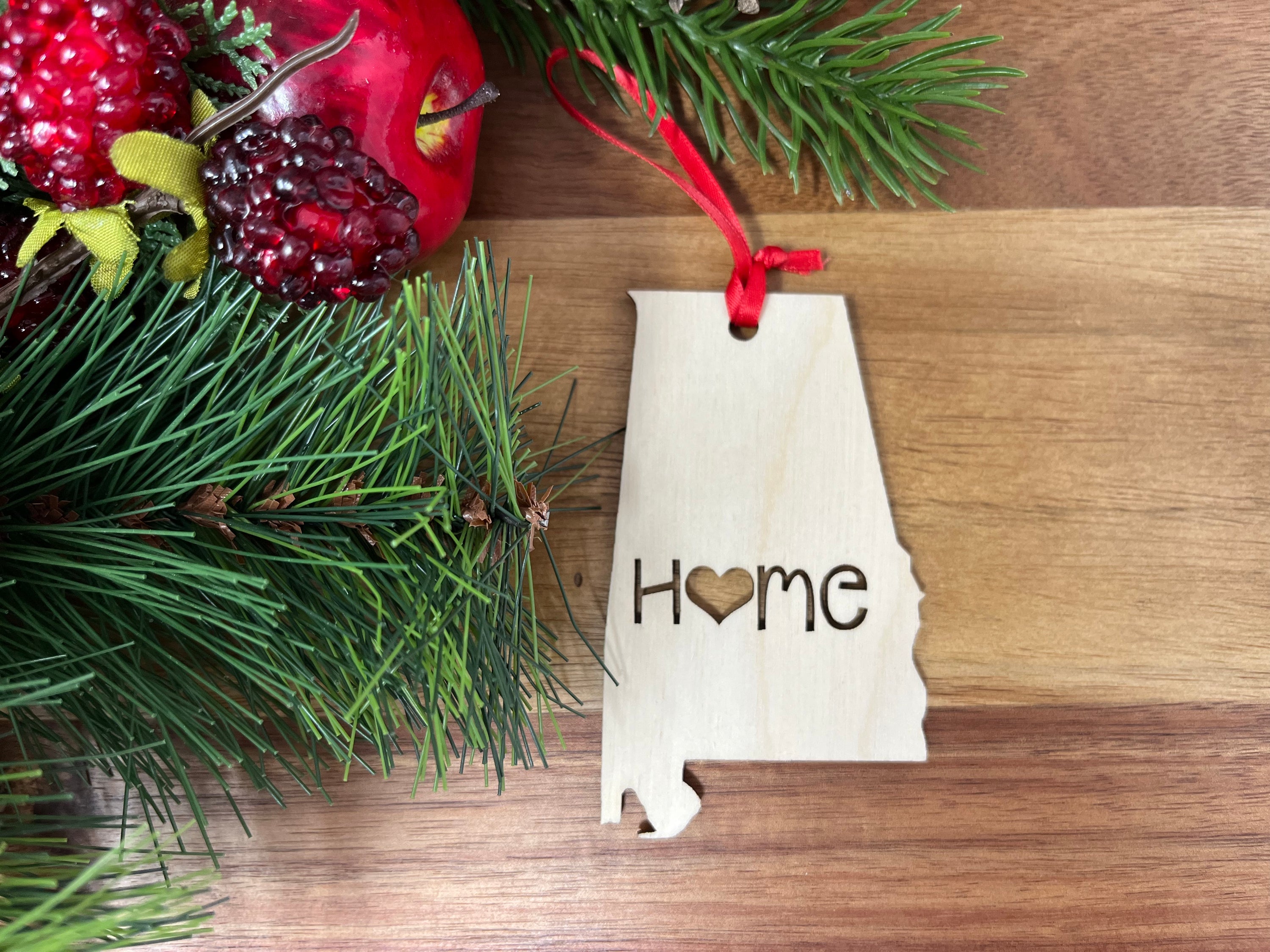 Alabama State Wood Christmas Ornament made from Baltic Birch, featuring a charming design perfect for holiday decor.