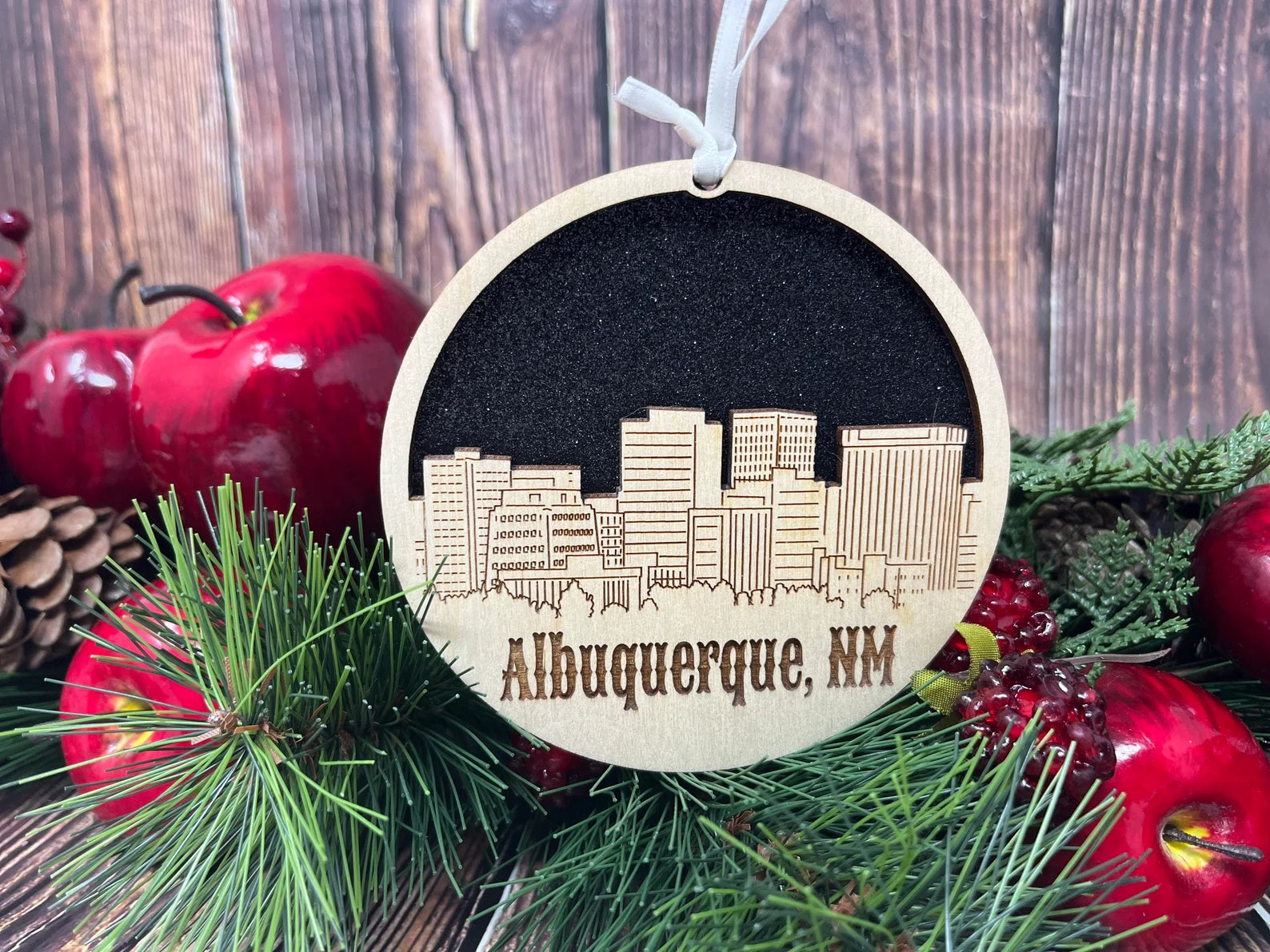 Albuquerque Skyline Ornament made from premium Baltic birch wood, showcasing the city's skyline intricately cut and designed.