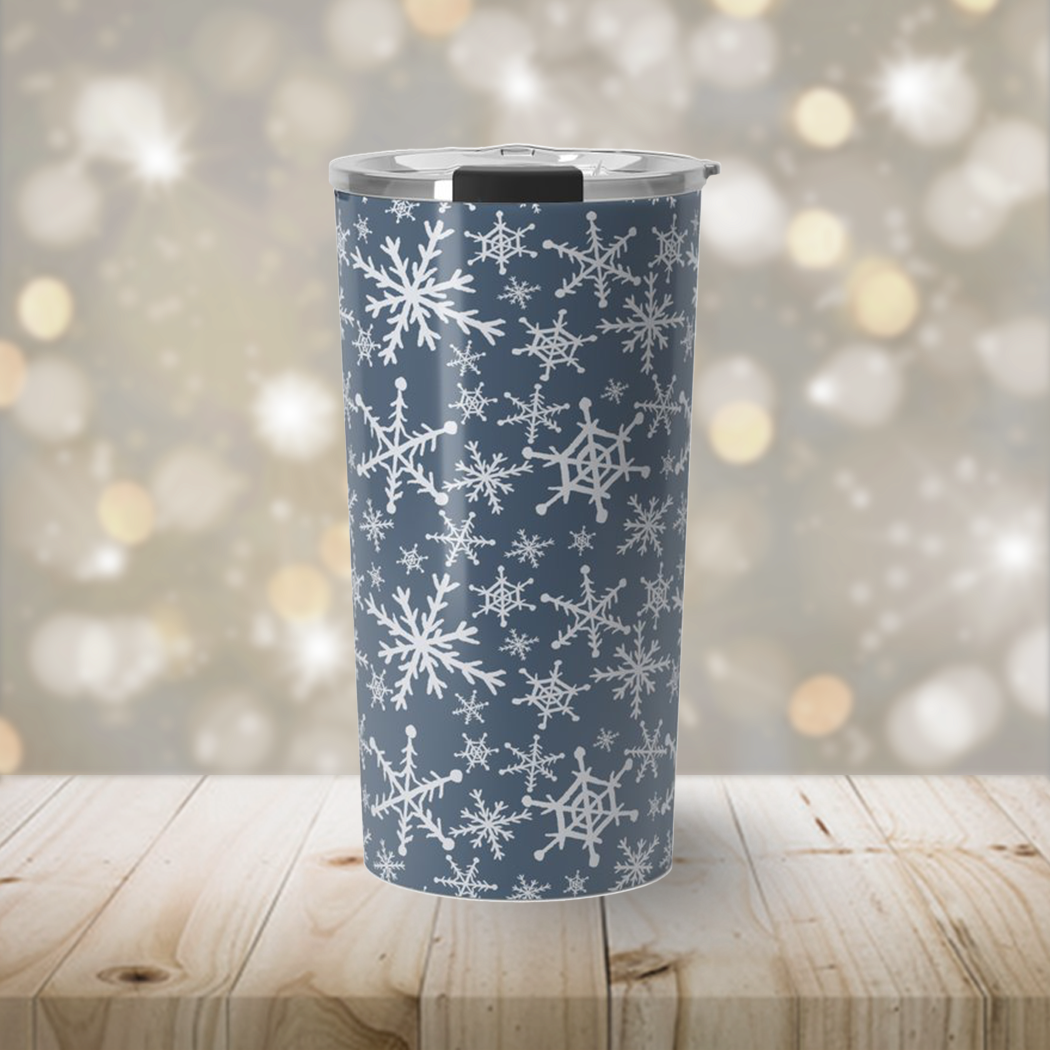 Blue Snowflakes Travel Coffee Mug featuring a stunning snowflake design, made of durable stainless steel with a vacuum-sealed lid.