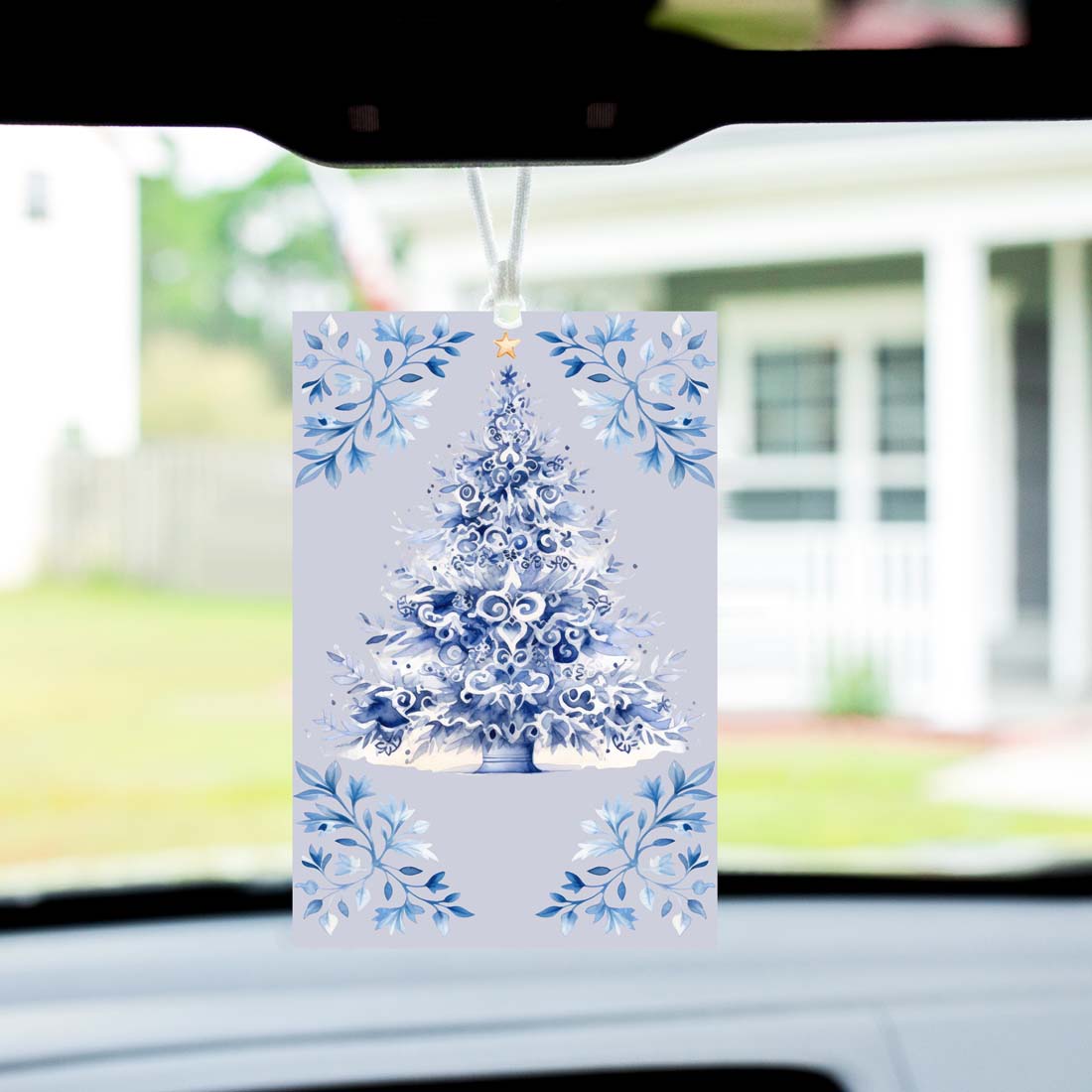 Blue Tree Freshie hanging air freshener with vibrant colors and charming design, perfect for adding fragrance to any space.