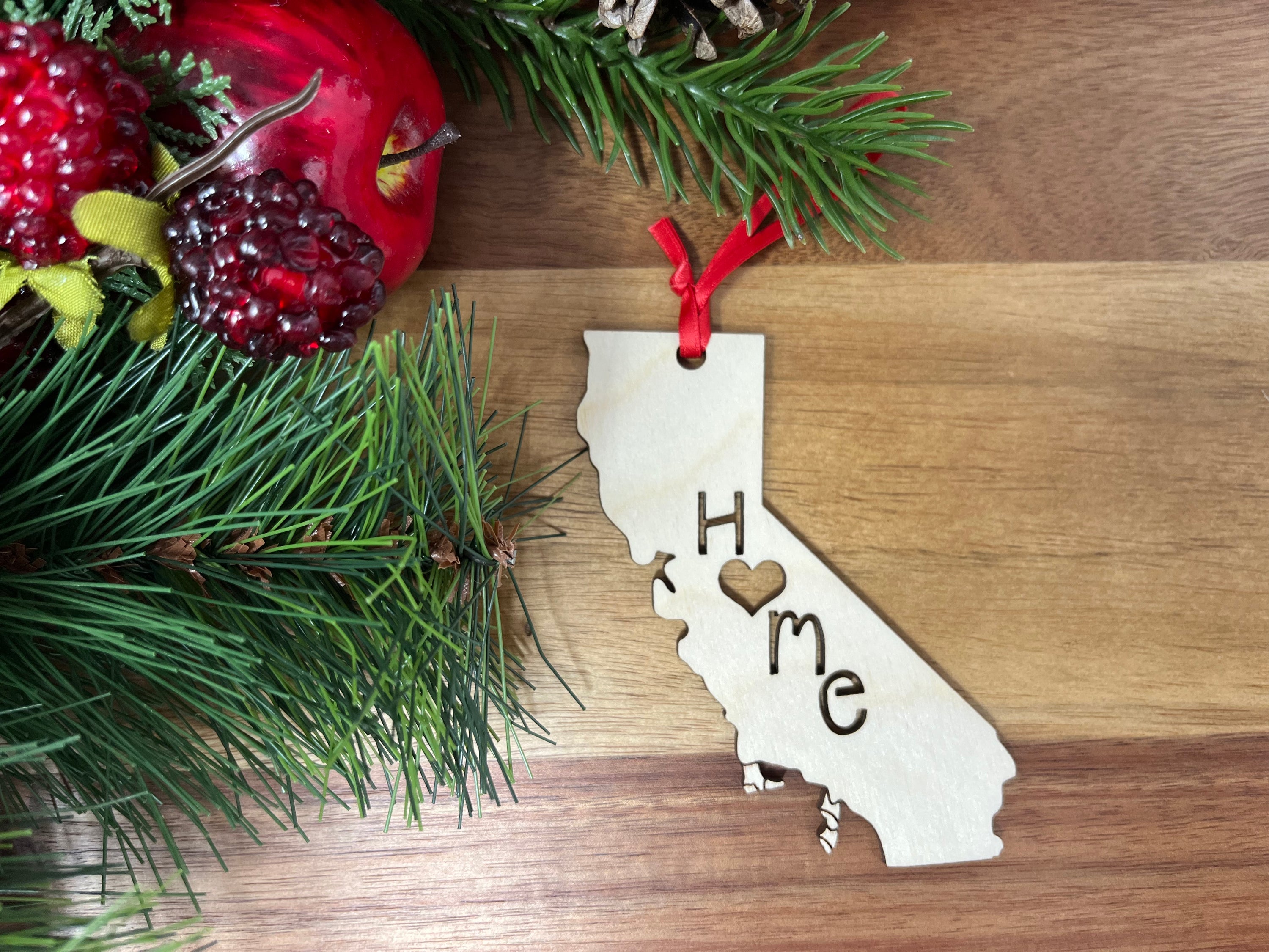 California State Wood Christmas Ornament made from premium Baltic Birch wood, featuring intricate detailing and a natural finish.