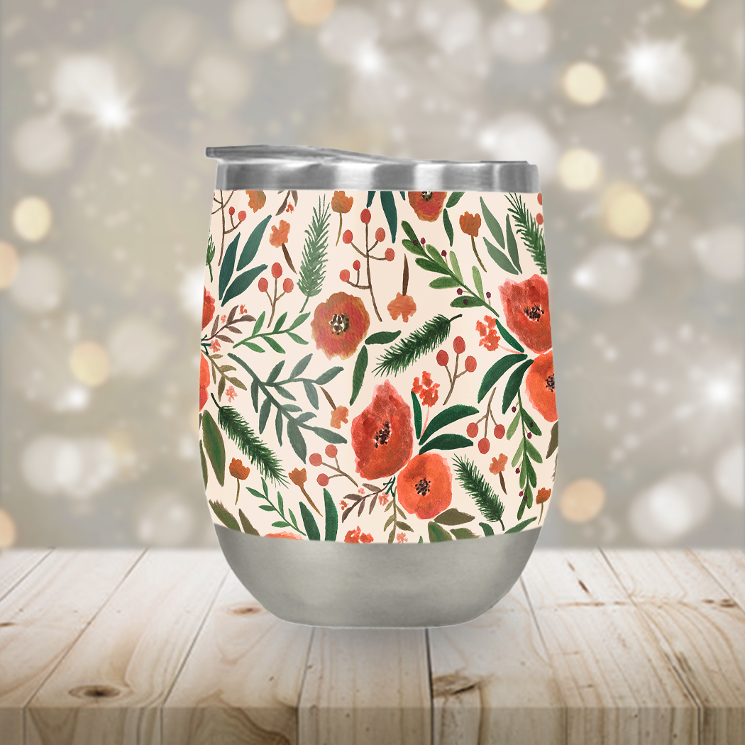 A stylish Christmas Floral Stemless Wine Tumbler featuring a vibrant floral design, perfect for outdoor parties and gatherings.