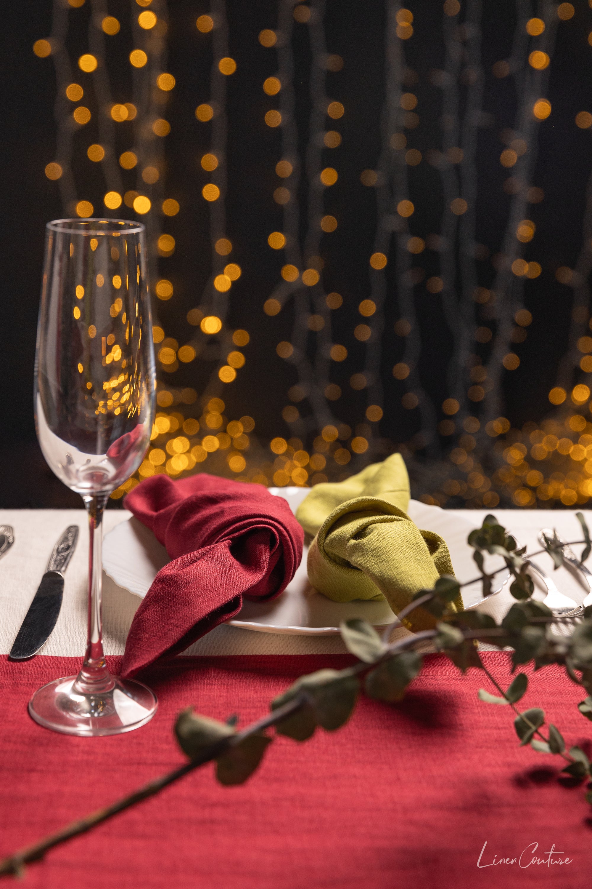 Set of two Christmas Pear Linen Dinner Napkins made from 100% stonewashed European linen, featuring a decorative hem and available in festive colors.
