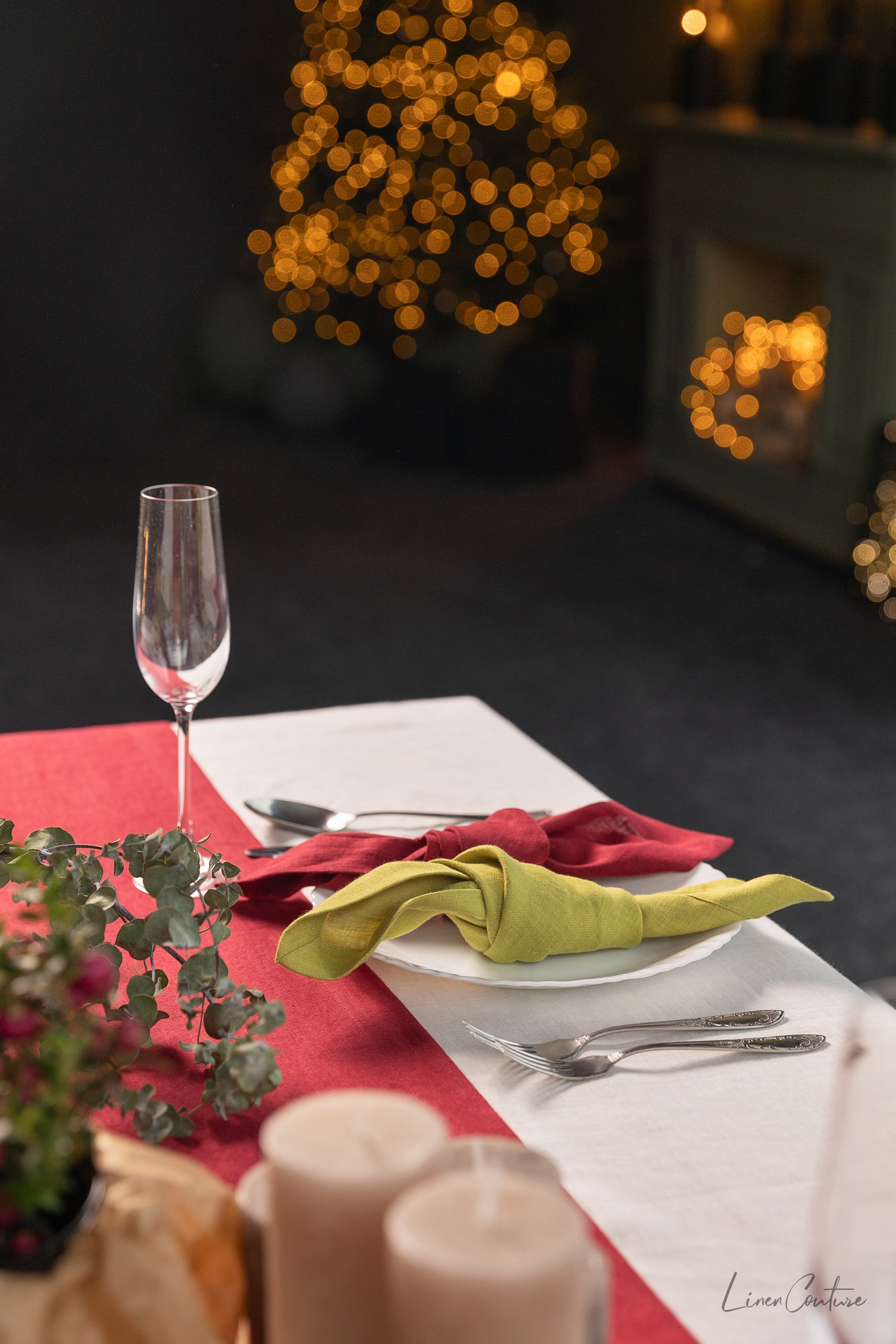 Set of two Christmas Pear Linen Dinner Napkins made from 100% stonewashed European linen, featuring a decorative hem and available in festive colors.