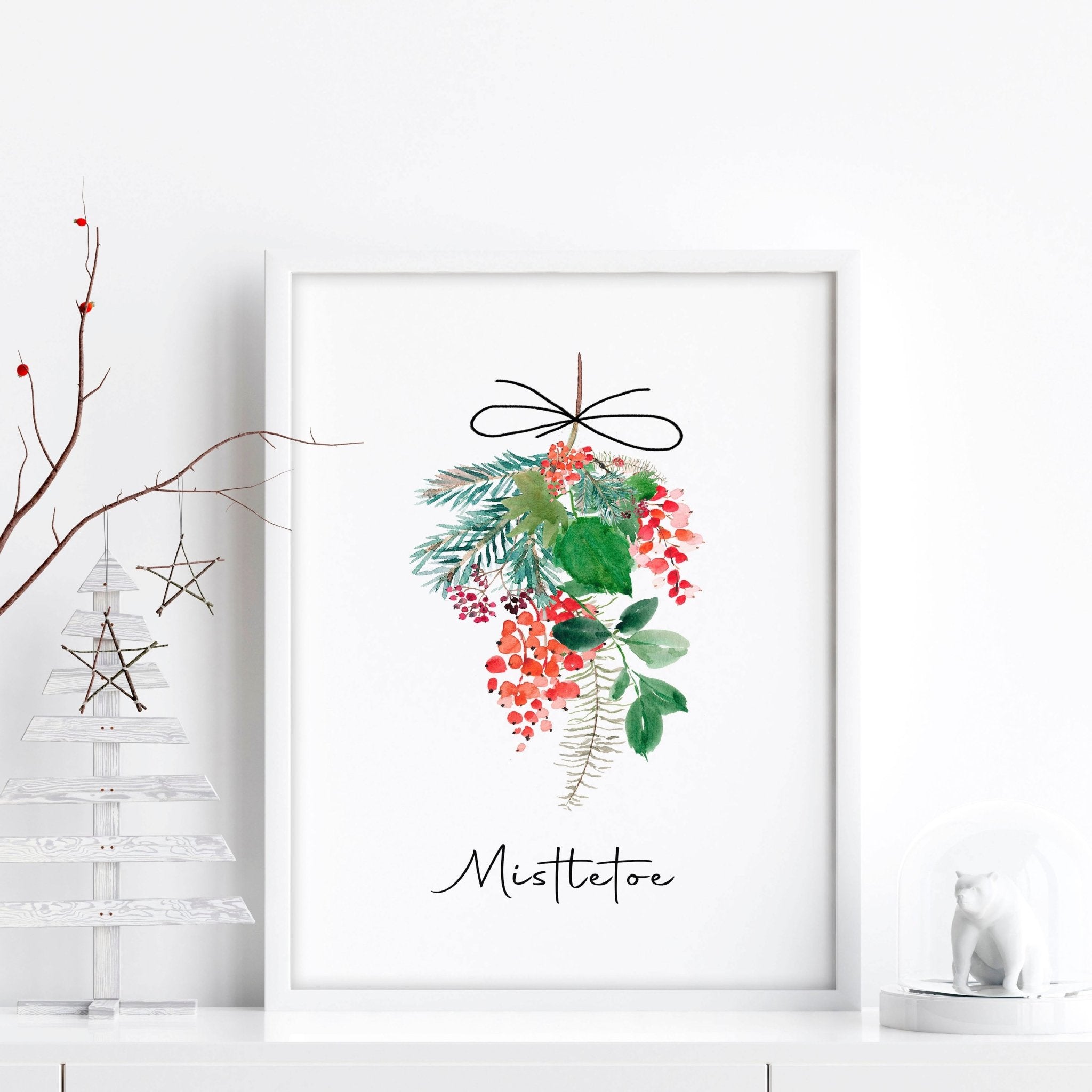 A beautiful watercolour mistletoe wall art print featuring lush green leaves and vibrant red berries, perfect for Christmas decor.