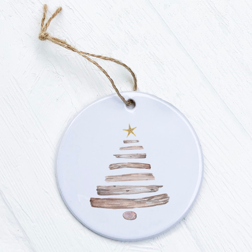 A beautifully crafted Driftwood Christmas Tree ornament made of high-quality porcelain, featuring a rustic design and smooth glossy finish.