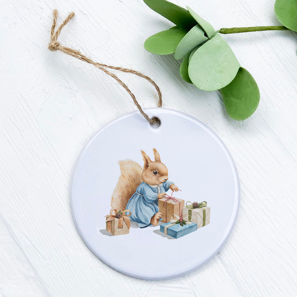 Fairytale Squirrel ornament featuring a whimsical design with presents, made of high-quality porcelain.