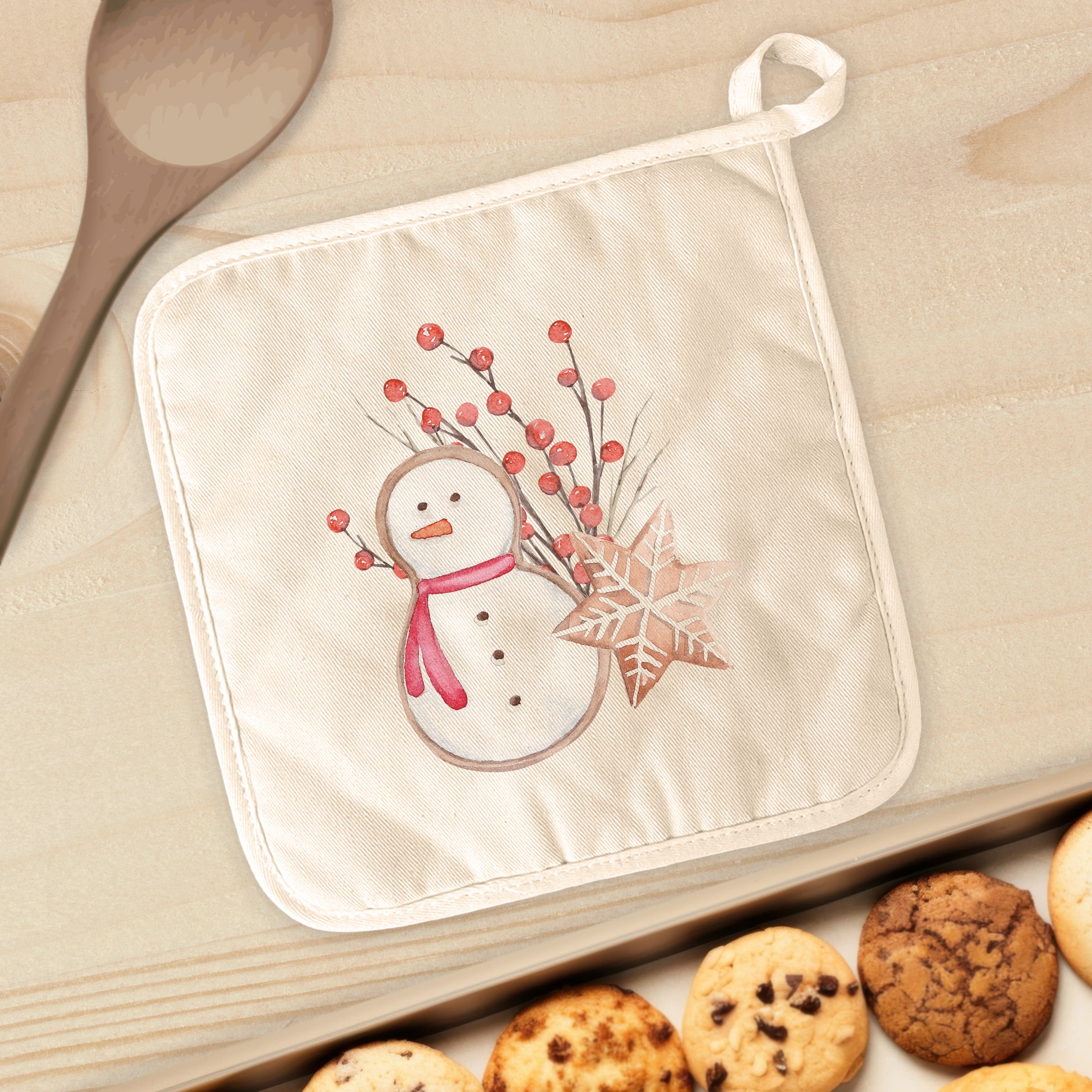 Gingerbread Snowman and Snowflake cotton pot holder with vibrant colors and quilted texture, perfect for kitchen use.