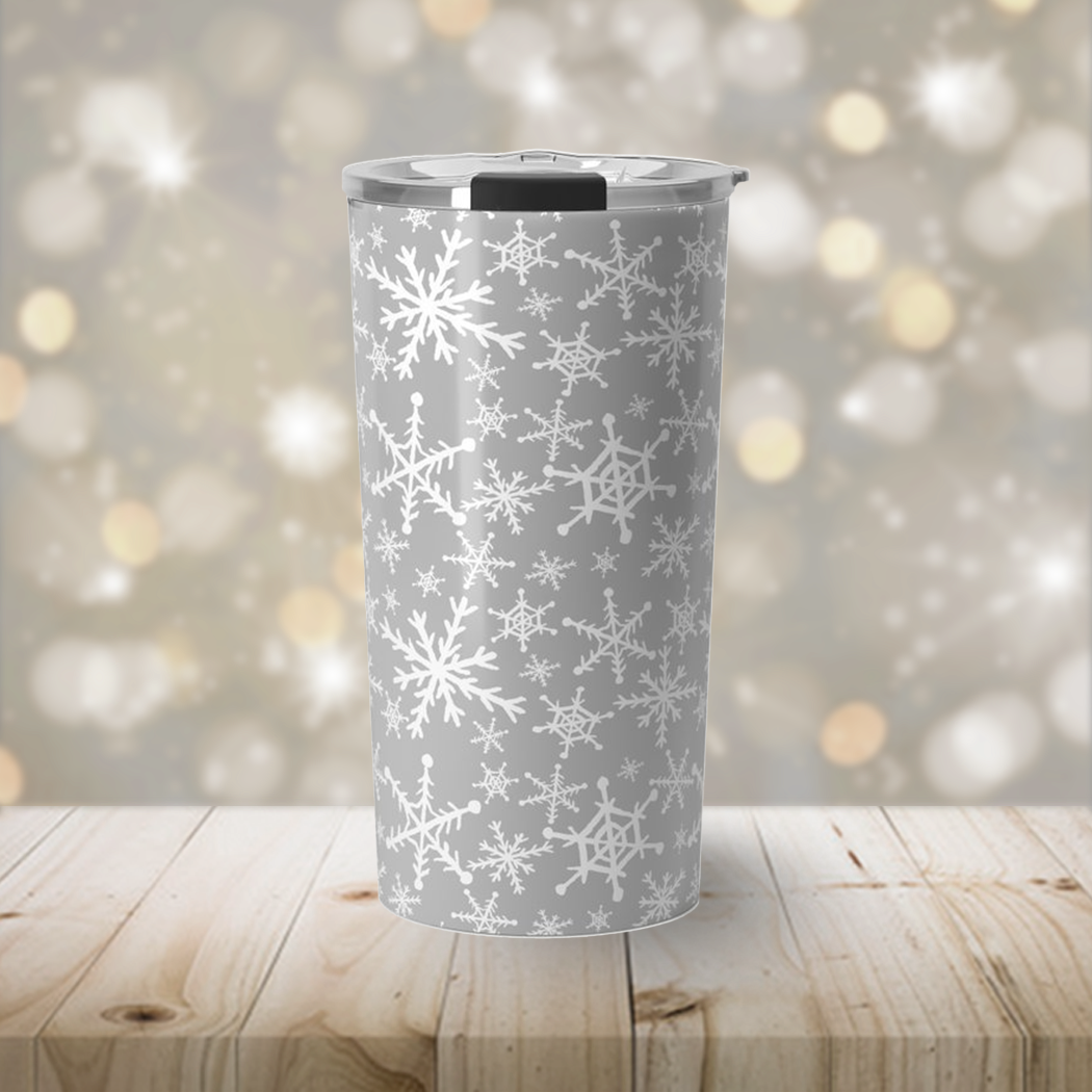 Gray Snowflakes Travel Coffee Mug with stainless steel body and winter-themed design, perfect for hot or cold beverages.