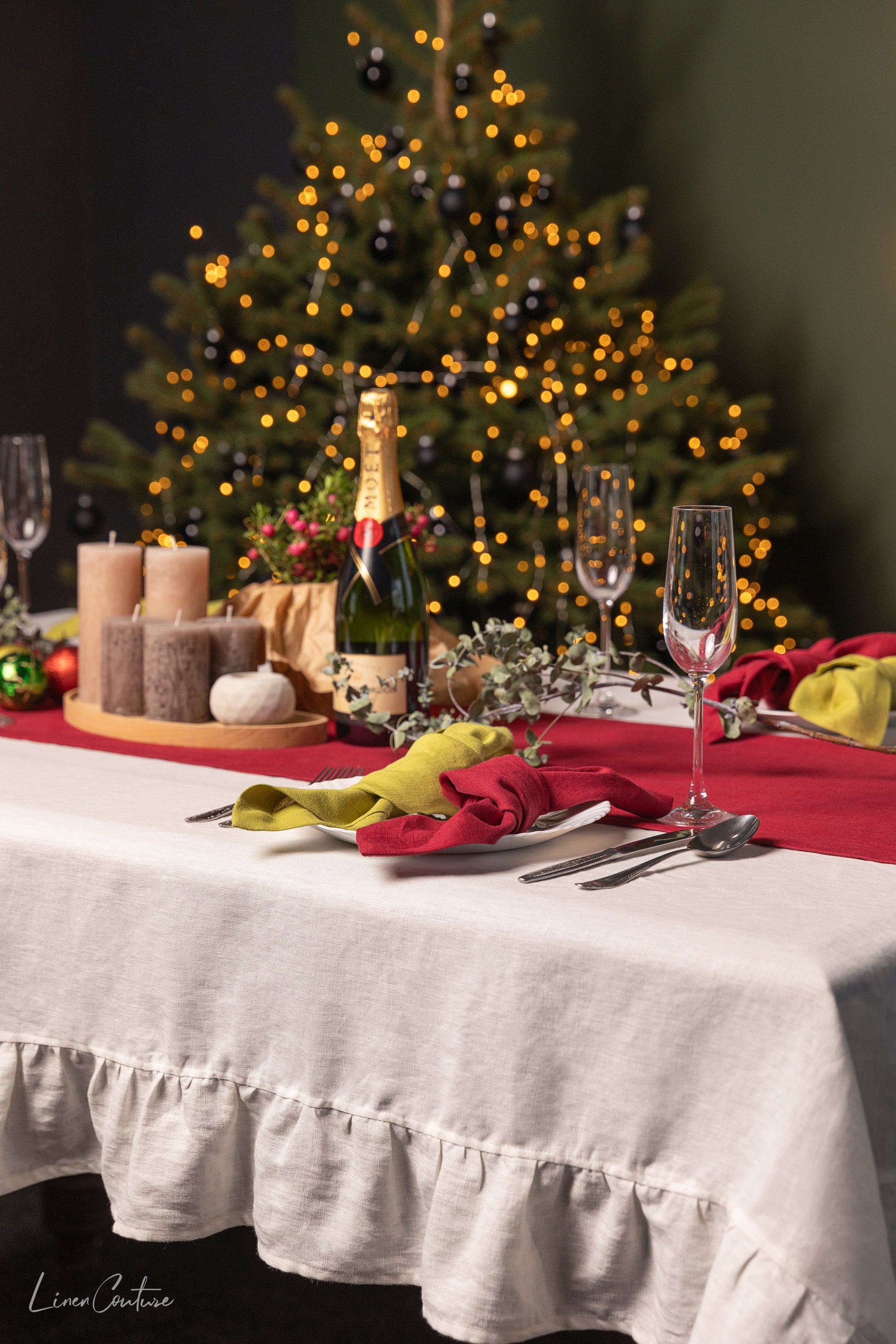 Handmade white linen Christmas tablecloth with elegant ruffles, showcasing premium European linen craftsmanship.
