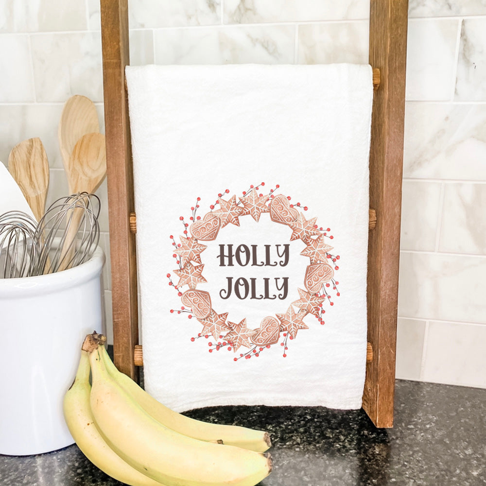 Holly Jolly Gingerbread Wreath cotton tea towel featuring a festive gingerbread design, perfect for holiday kitchen decor.