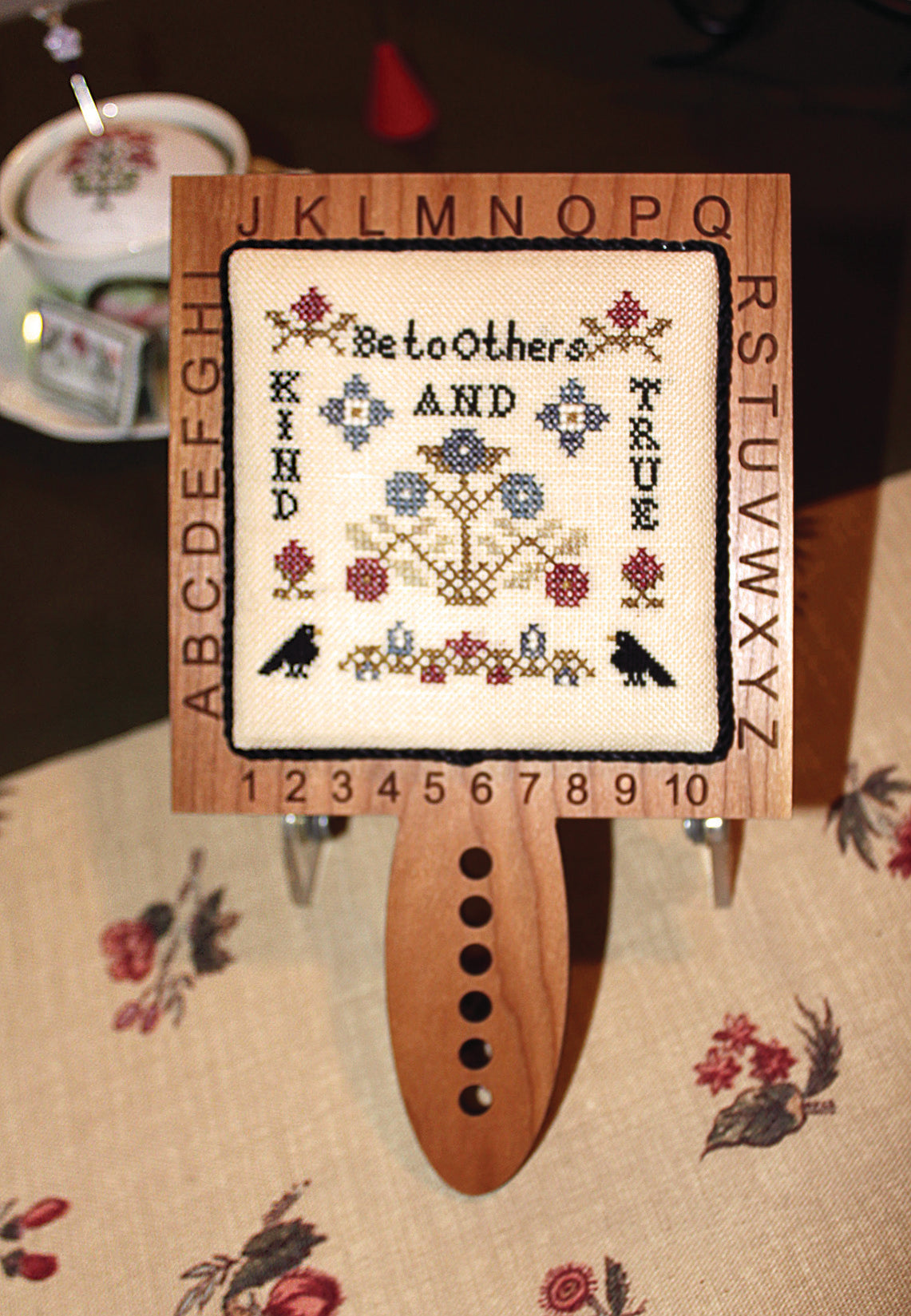 Horn Book ABC's made of cherry hardwood, featuring the alphabet and numbers, designed for children's education.