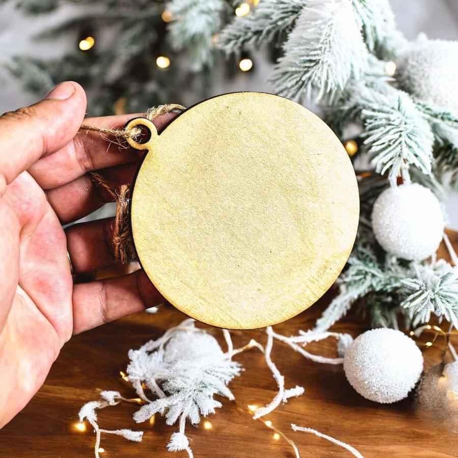 Handcrafted 3D Wooden Christmas Ornaments in various colors, showcasing unique designs and rustic jute twine for hanging.