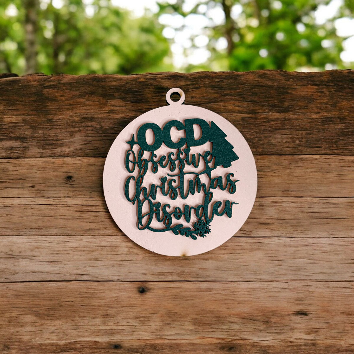 Handcrafted 3D Wooden Christmas Ornaments in various colors, showcasing unique designs and rustic jute twine for hanging.