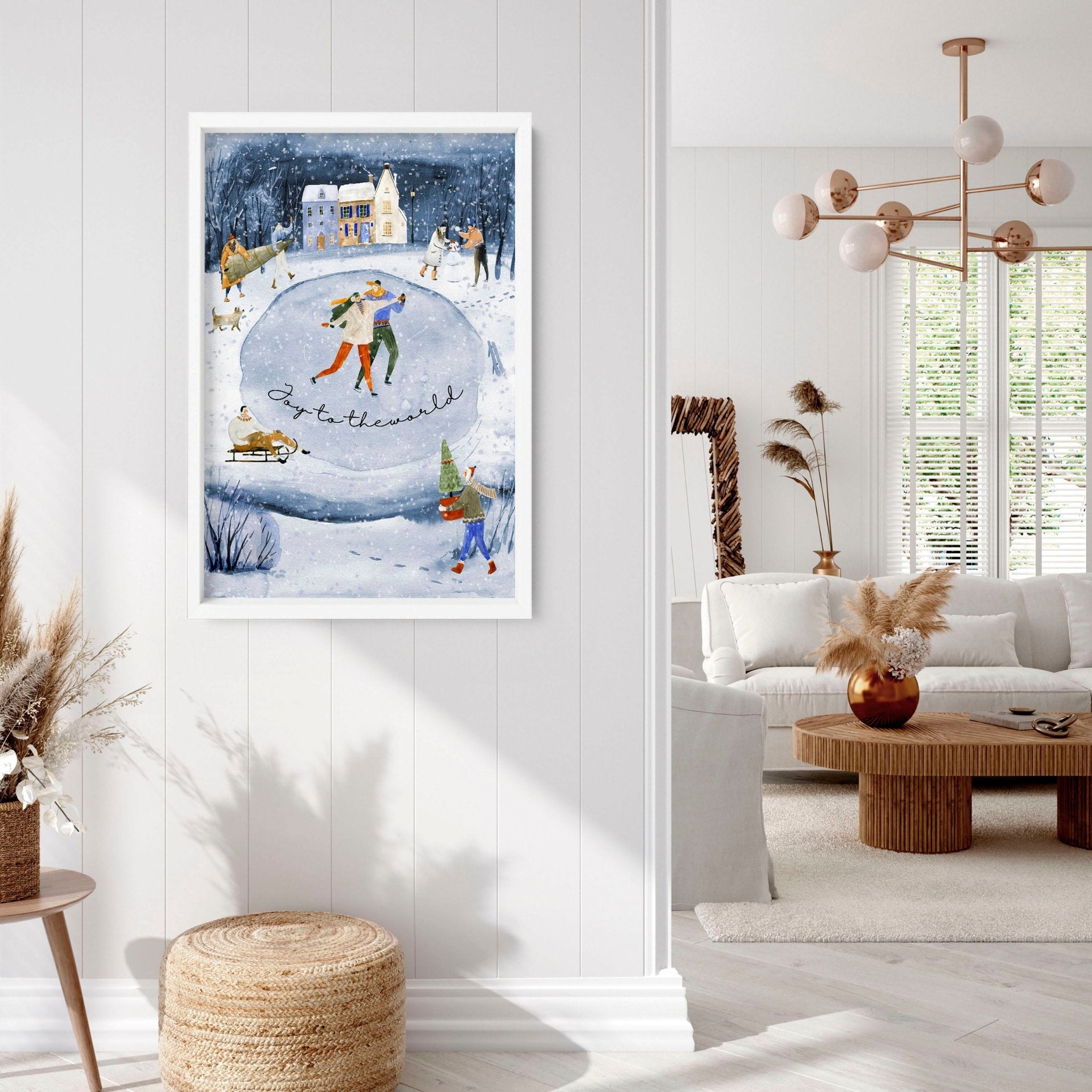 A beautiful indoor Christmas wall art print featuring a serene blue watercolour landscape with a snowy pond and a charming village adorned with lights.