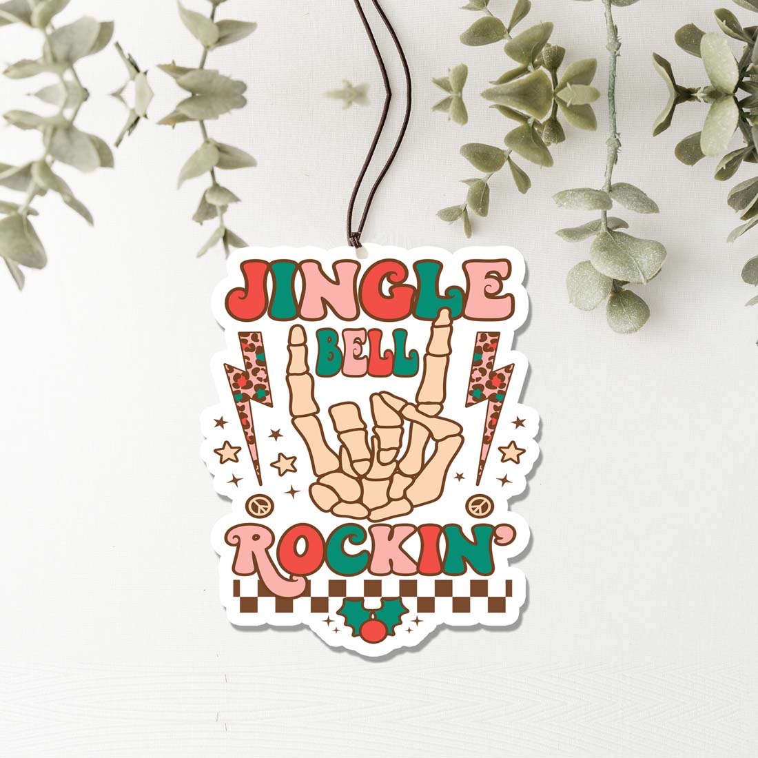 Jingle Bell Freshie hanging air freshener with festive design, perfect for holiday decor and freshening up spaces.