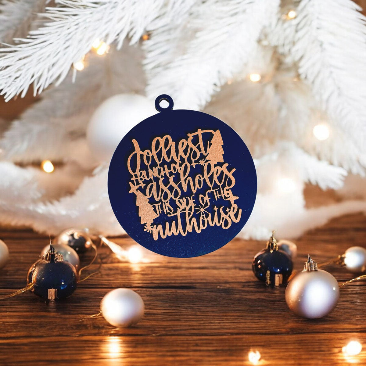 Jolliest Bunch Wooden Ornament featuring festive graphics and rustic twine, available in 12 vibrant colors.
