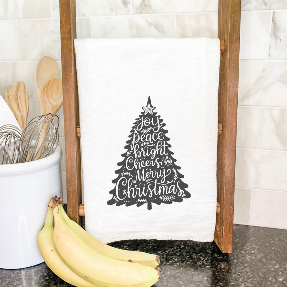 Joy Christmas Tree Cotton Tea Towel featuring a vibrant holiday design, made from 100% absorbent cotton, perfect for kitchen use.