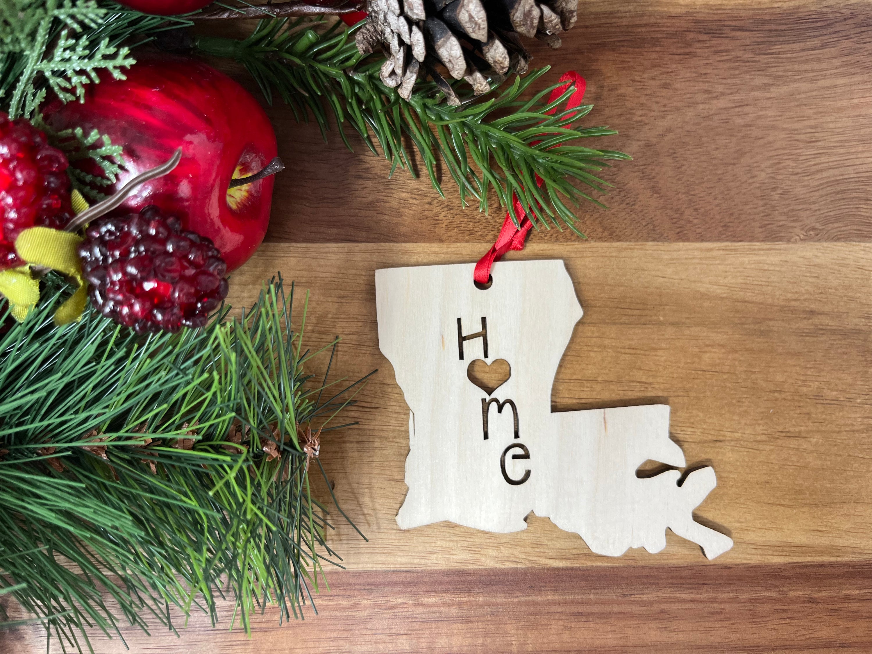 Louisiana State Wood Christmas Ornament made from premium Baltic Birch wood, featuring intricate design and rustic charm.