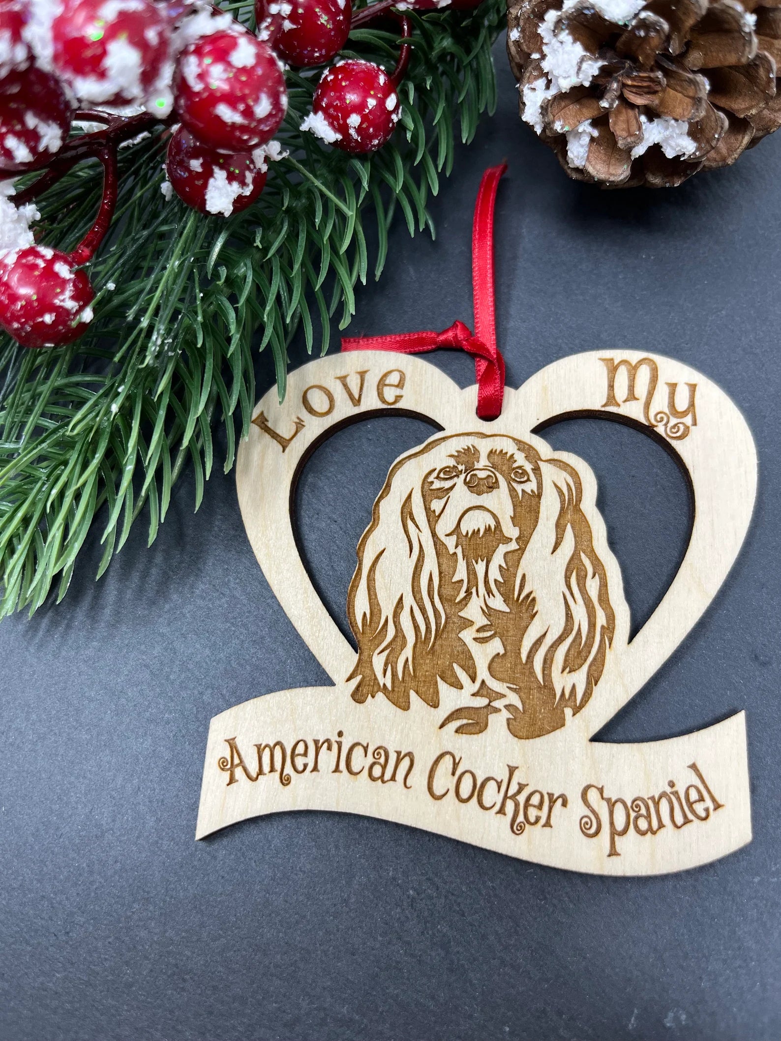 Beautiful laser engraved wooden ornament featuring an American Cocker Spaniel, perfect for Christmas decoration.