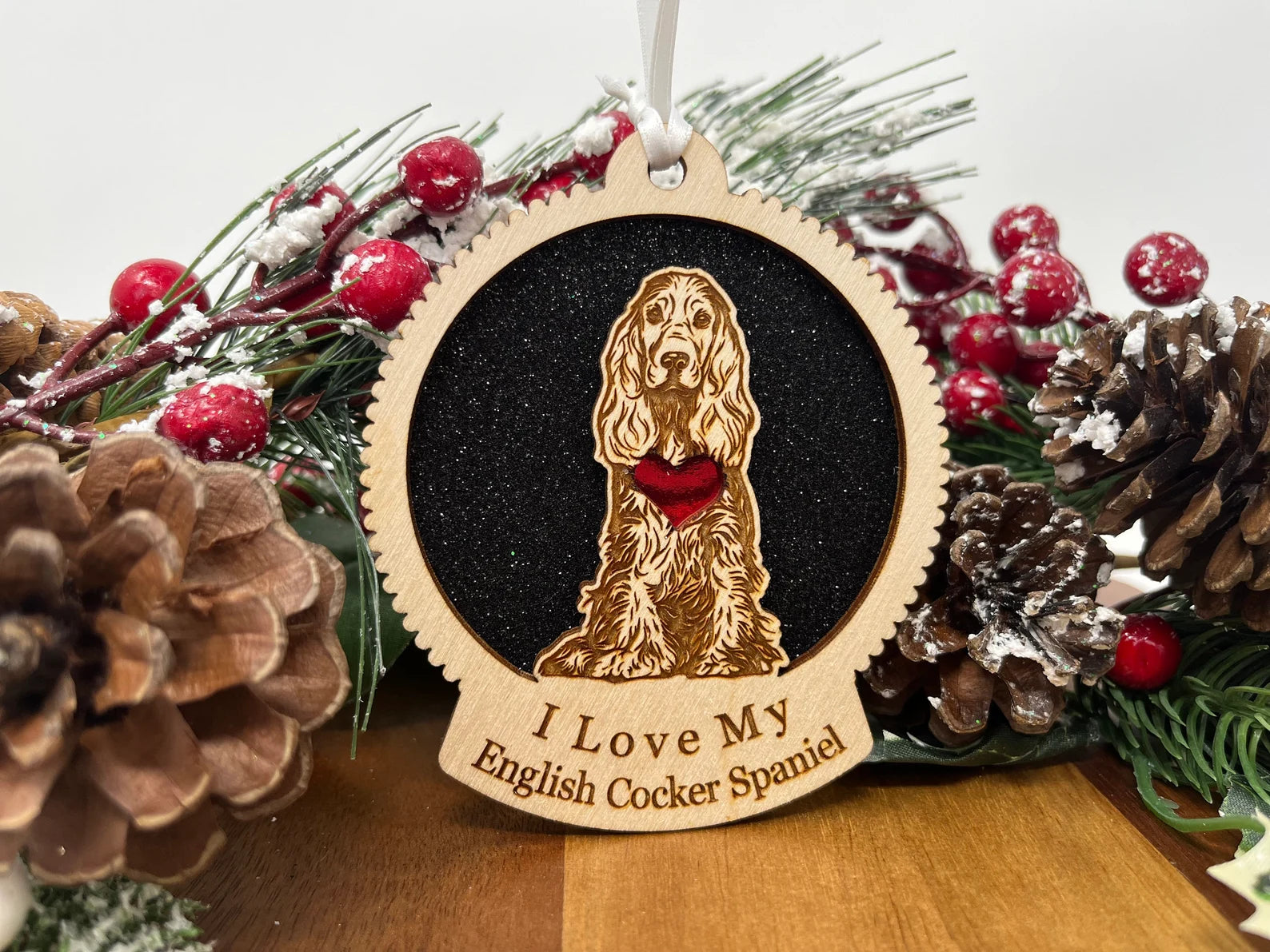 Beautiful laser-cut wooden ornament featuring an English Cocker Spaniel silhouette, perfect for Christmas decoration.