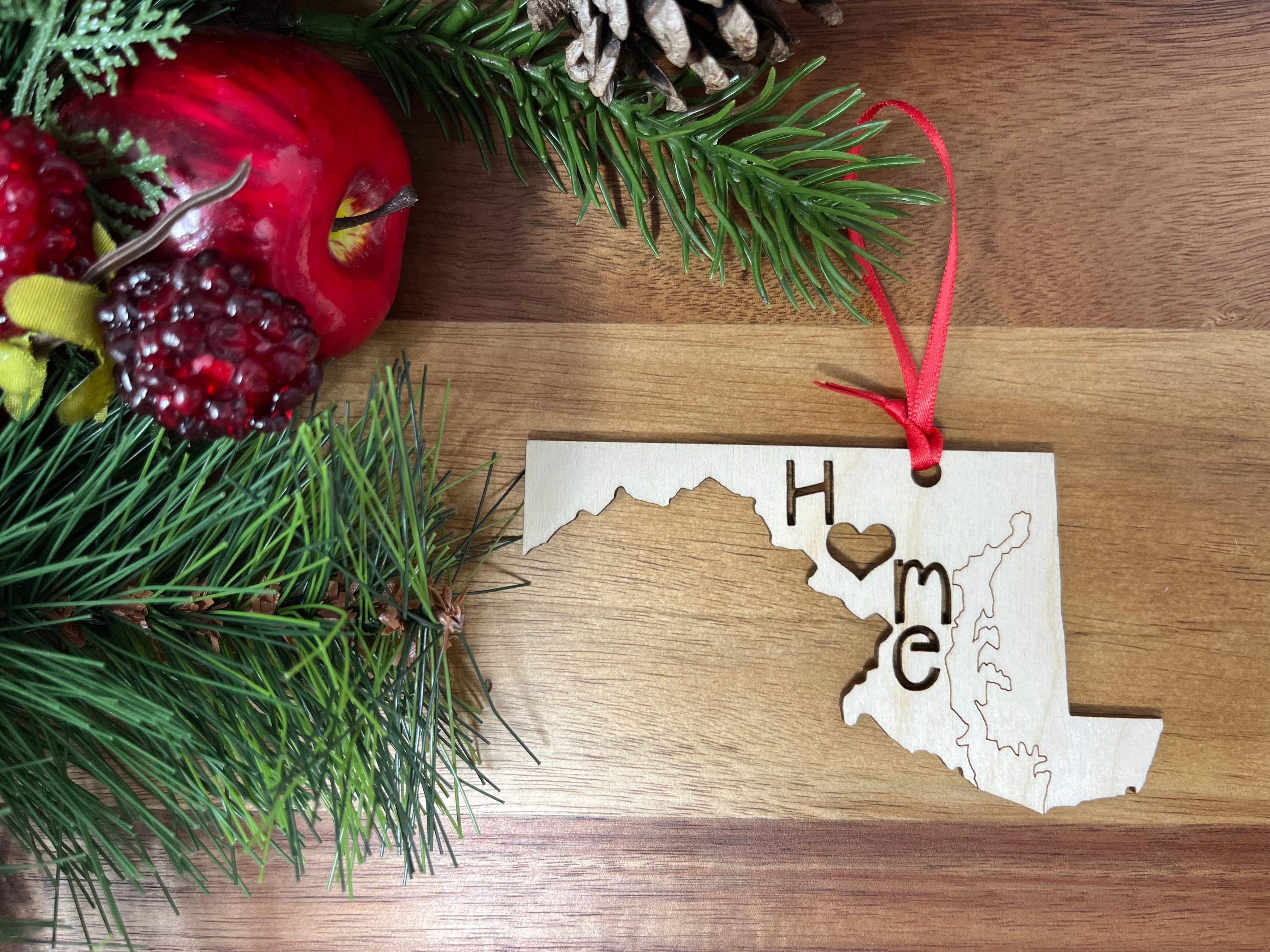 Maryland State Wood Christmas Ornament made from Baltic Birch, featuring intricate design and a hanging loop.