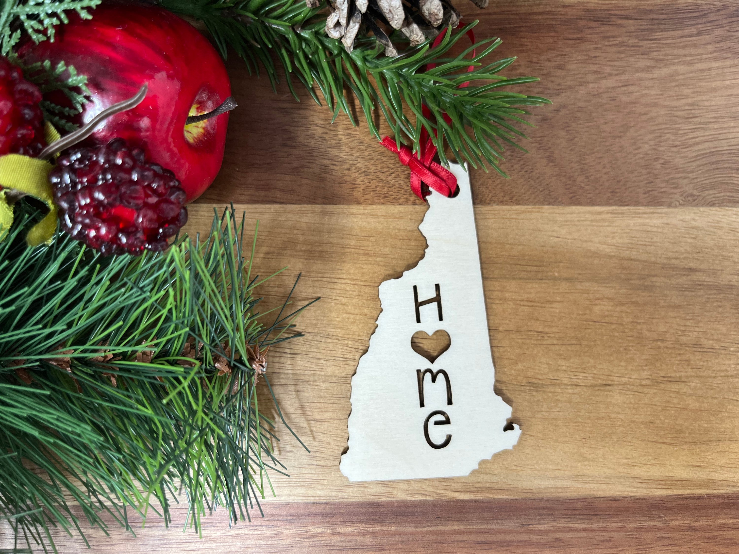 New Hampshire State Wood Christmas Ornament made from Baltic Birch, featuring an adorable 'Home' design.