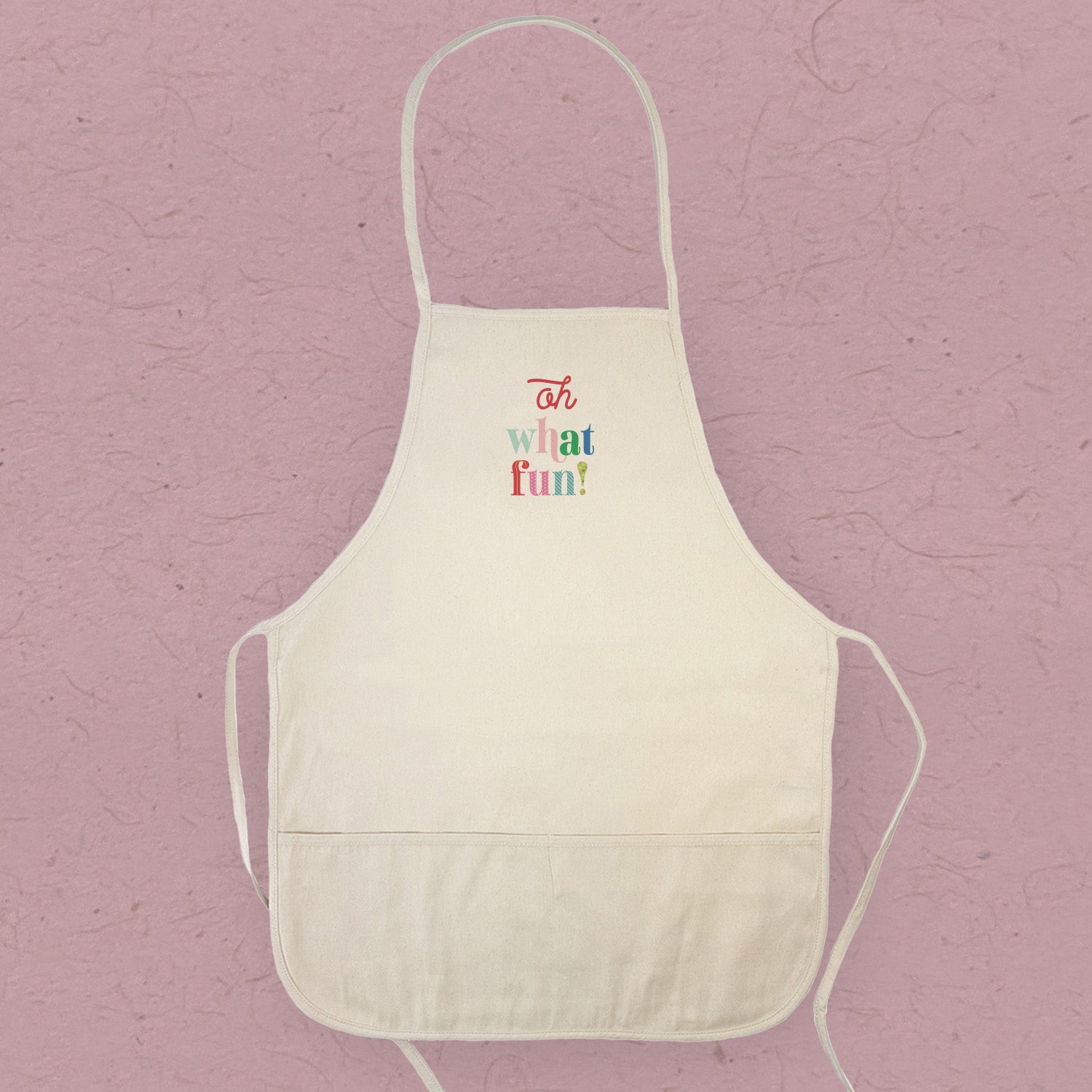 Oh What Fun Women's Apron in elegant design, made of durable cotton canvas with natural twill ties and a divided front pocket.