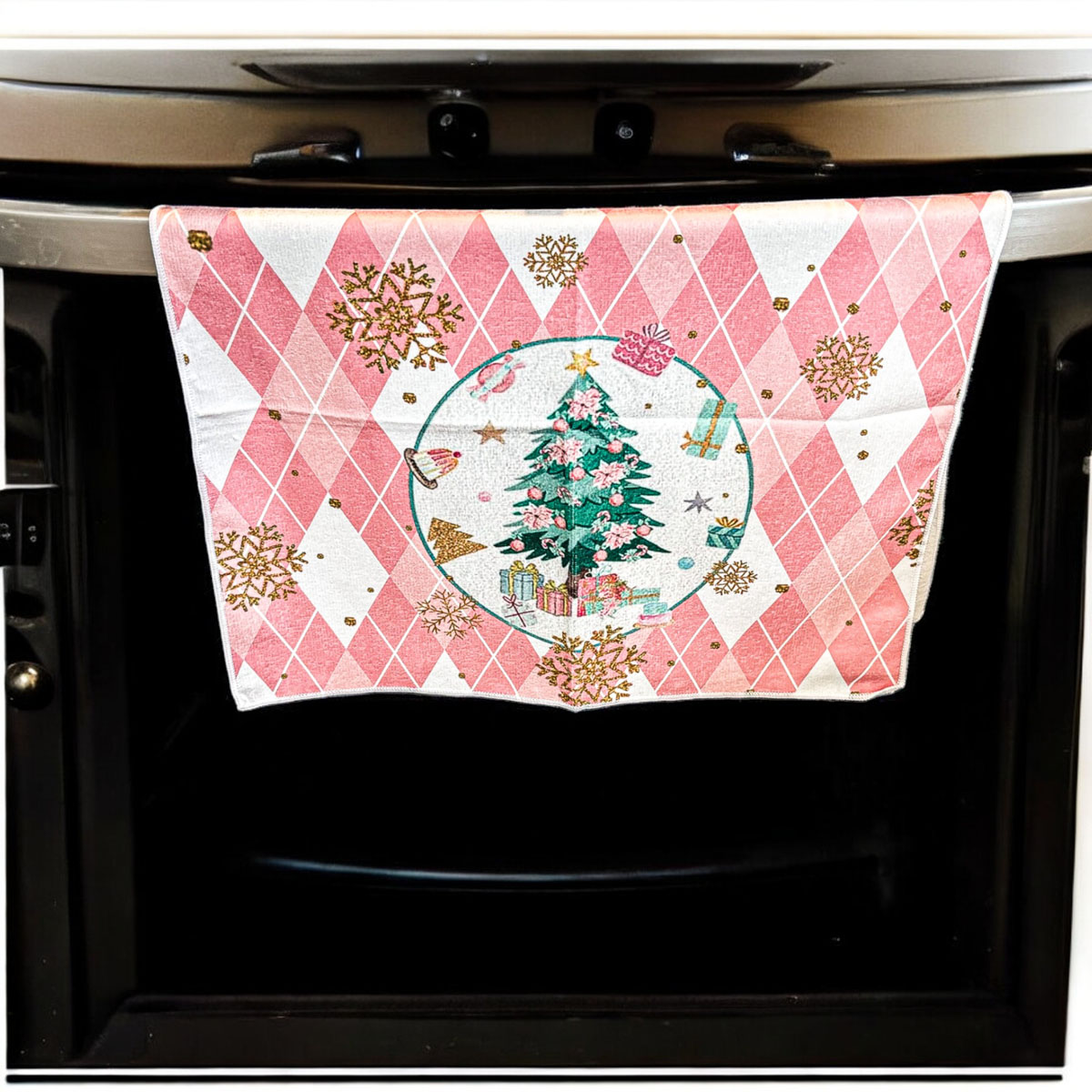 A soft and absorbent Pink Christmas Hand Towel featuring festive designs, perfect for holiday kitchen decor.