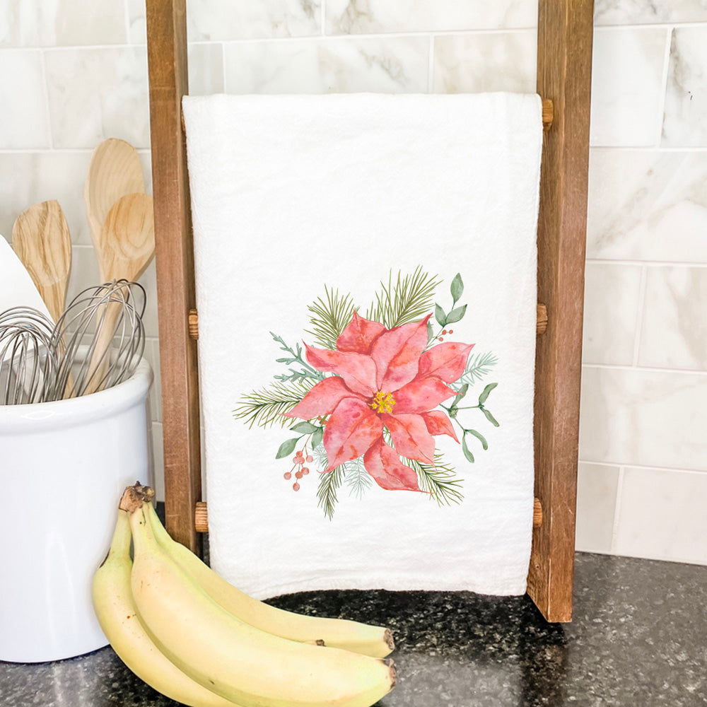 A vibrant Poinsettia Flower Cotton Tea Towel featuring a beautiful floral design, perfect for kitchen use.