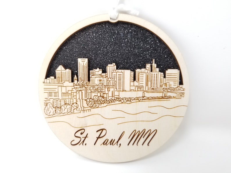 Saint Paul Skyline Ornament made from premium Baltic birch wood, showcasing the city's skyline intricately cut.